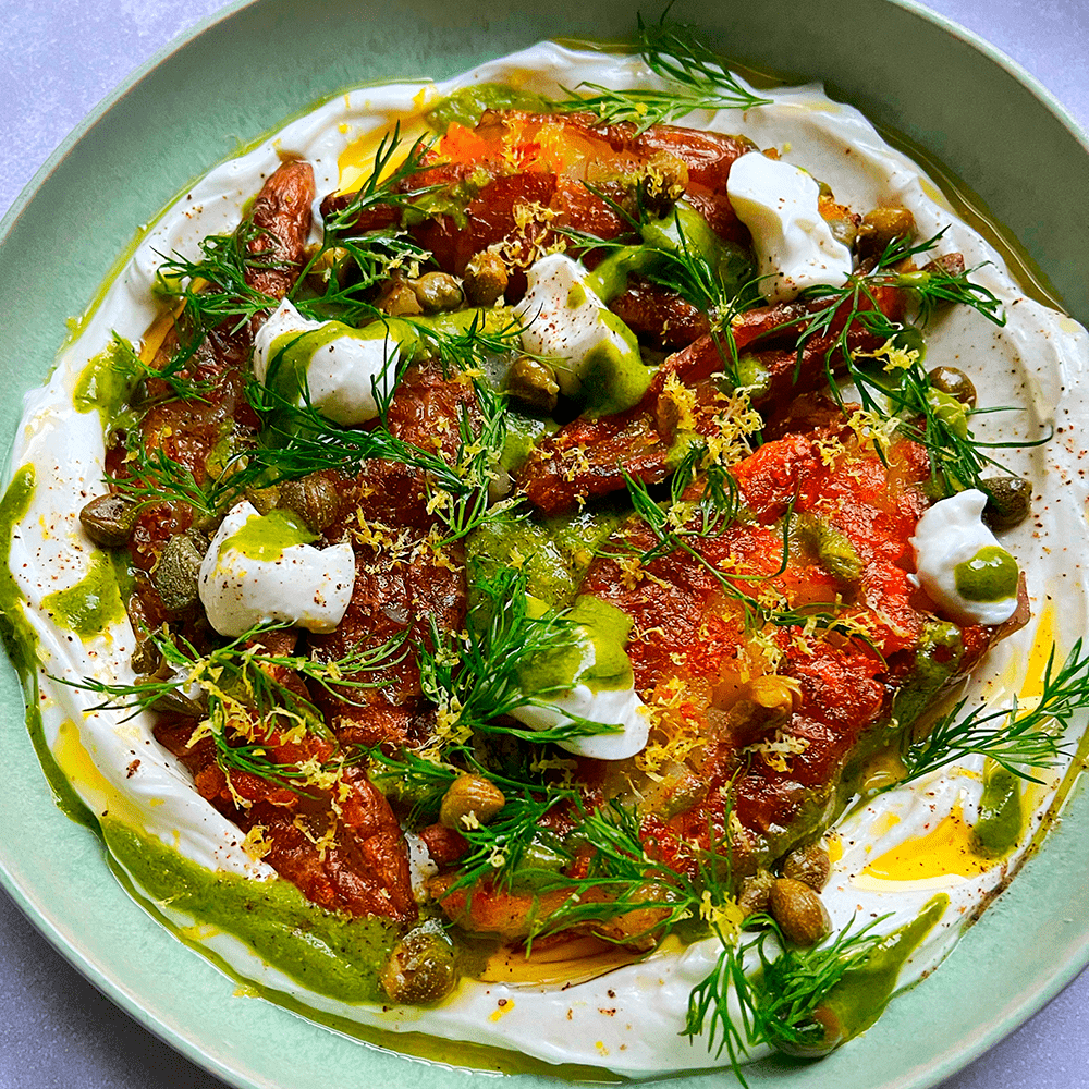 Crispy smashed Jerusalem artichokes with dill caper dressing & yoghurt
