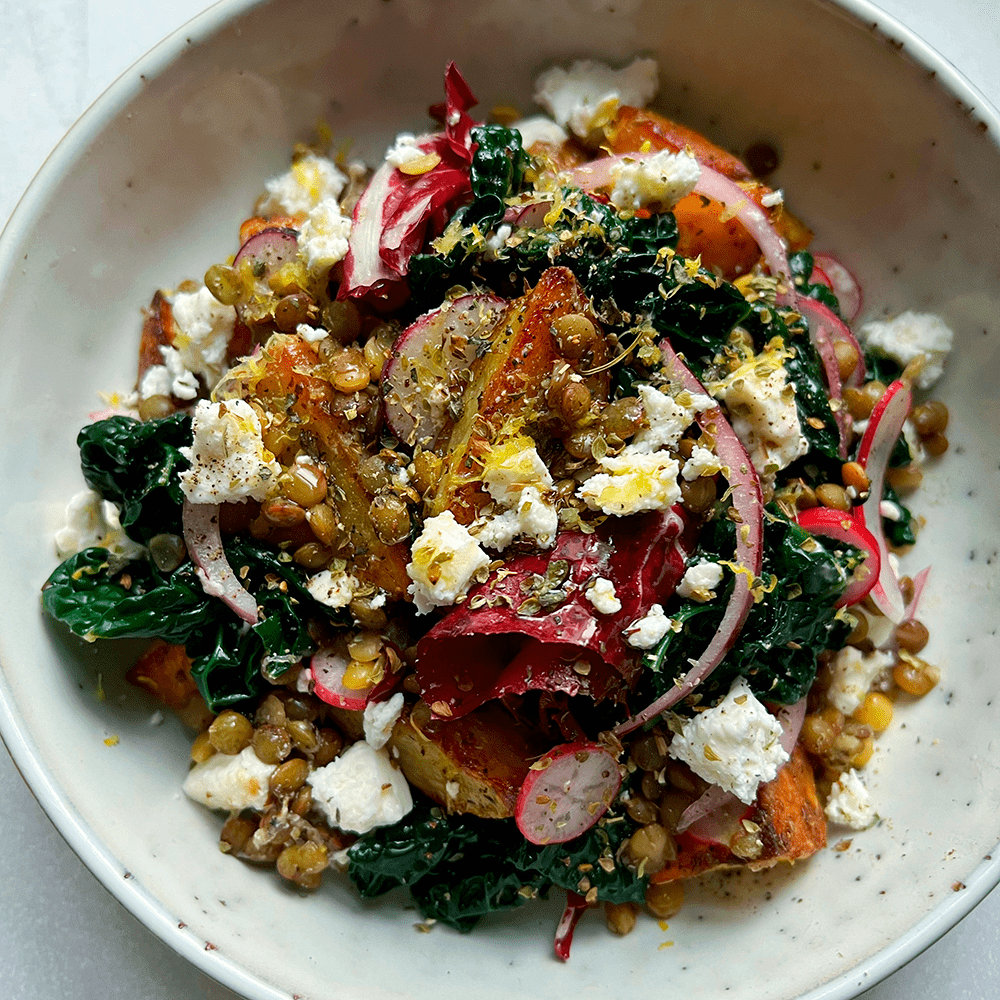 Warm salad of oregano roast potatoes, lentils & feta